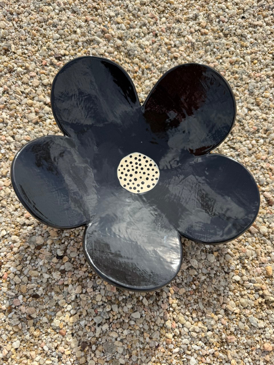 Shiny black flower